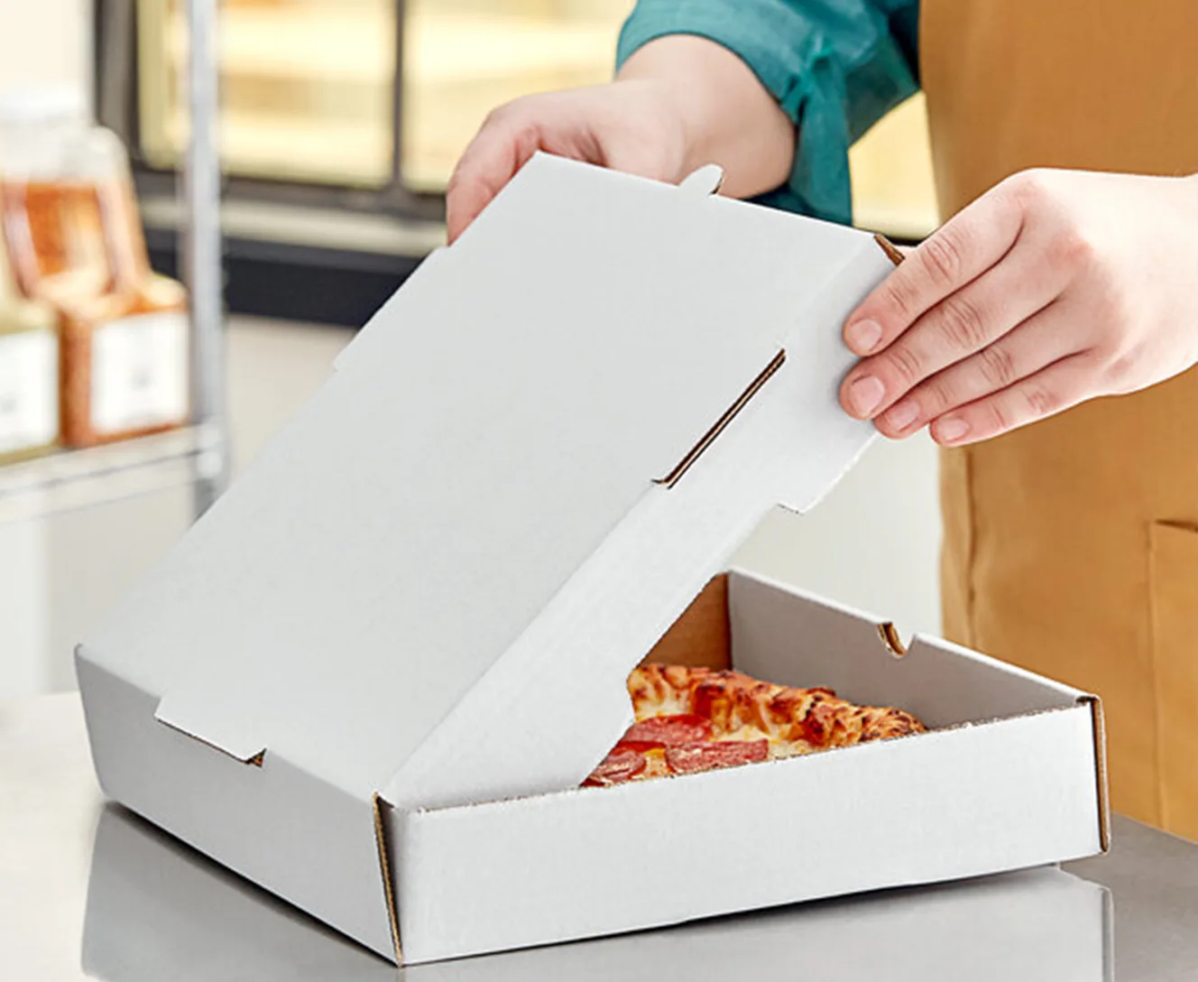 Il materiale della scatola per pizza personalizzata.